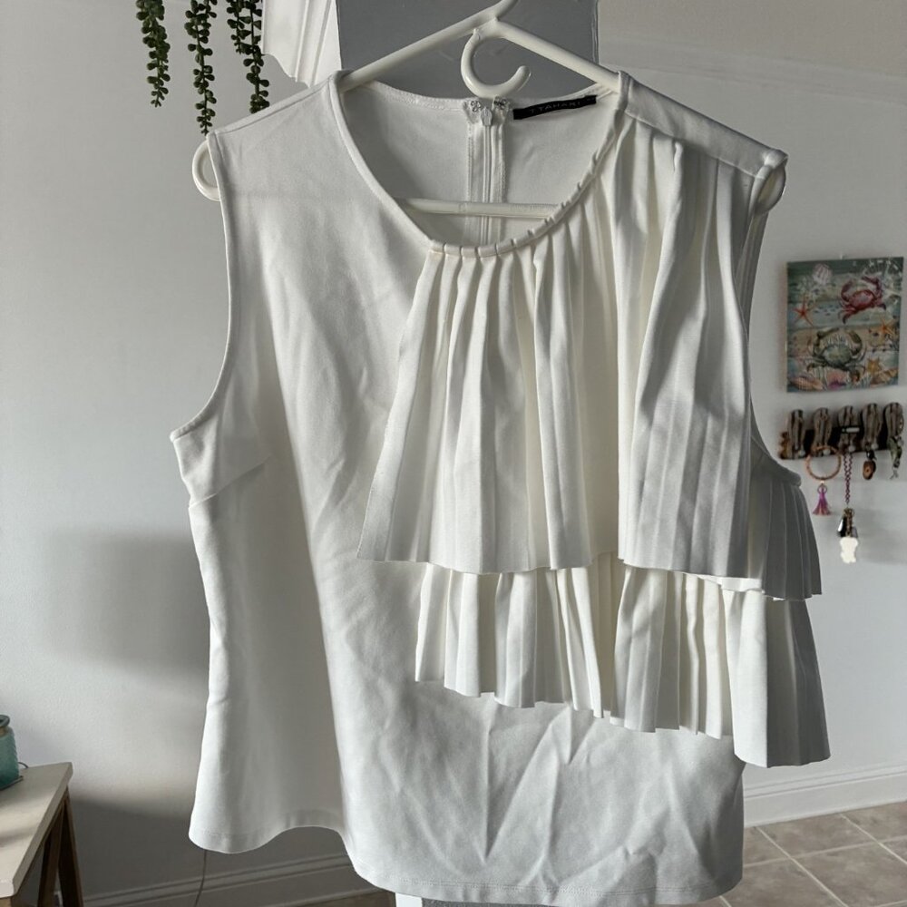 Tahari size Xl top with unique style.   Stretch material -white cream color.